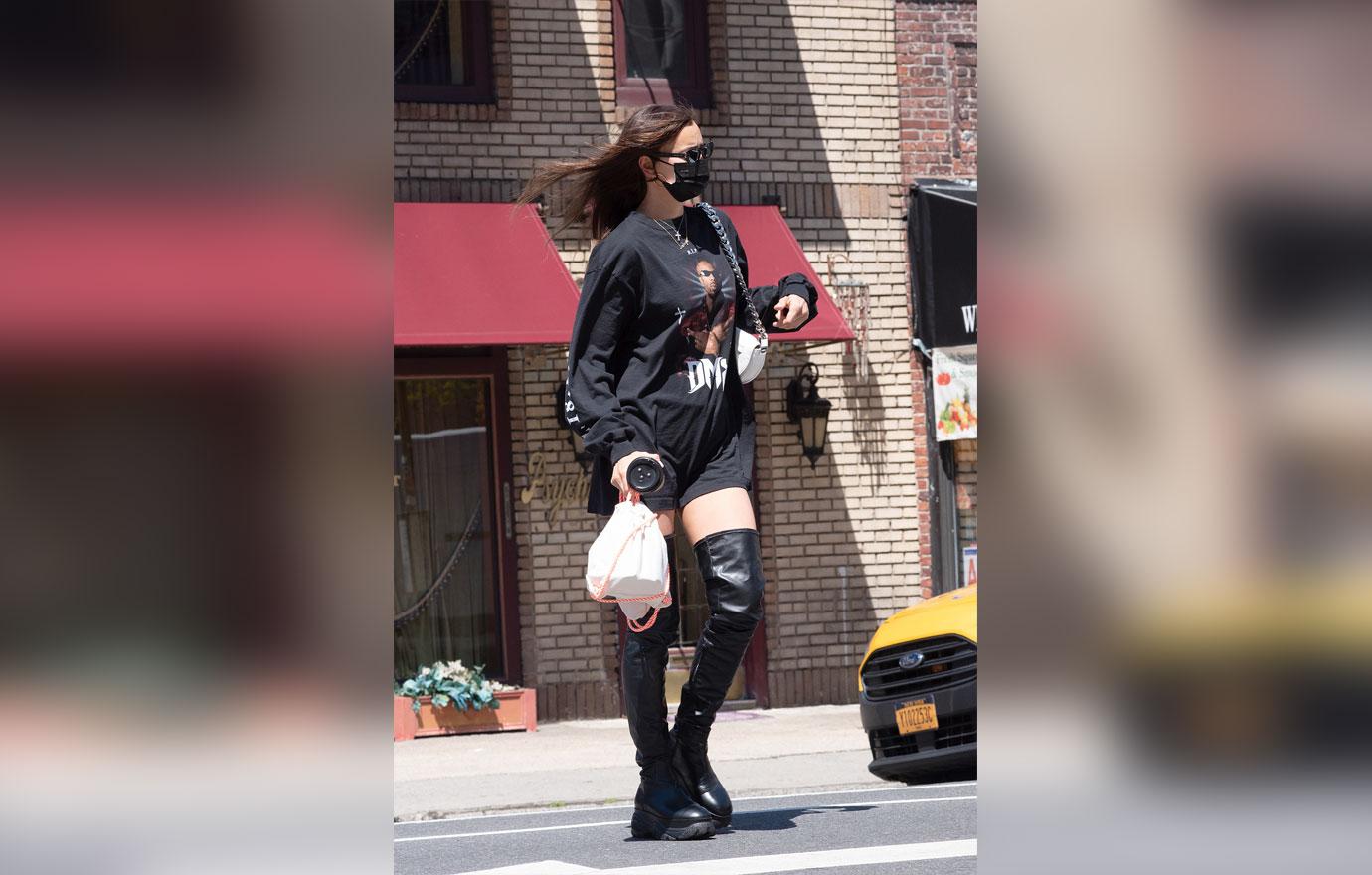 irina shayk wears high boots and dmx t shirt in tribeca