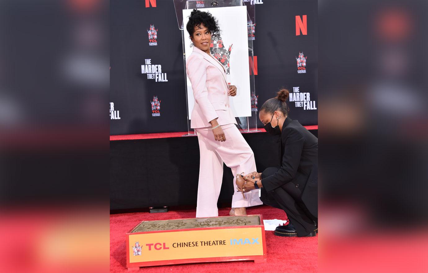 regina king handprints and footprints ceremony at the tcl chinese theatre