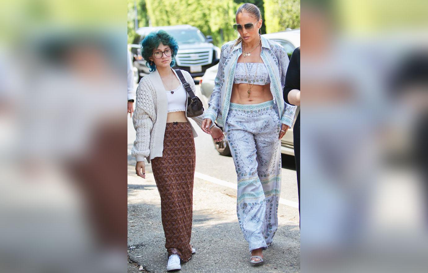 jennifer lopez attends the jennifer klein day of indulgence event with daughter emma showing off her toned abs