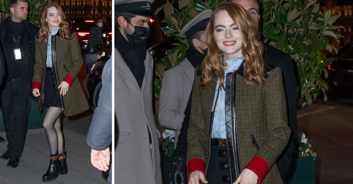 Emma Stone looks chic in plunging ivory blazer in Paris