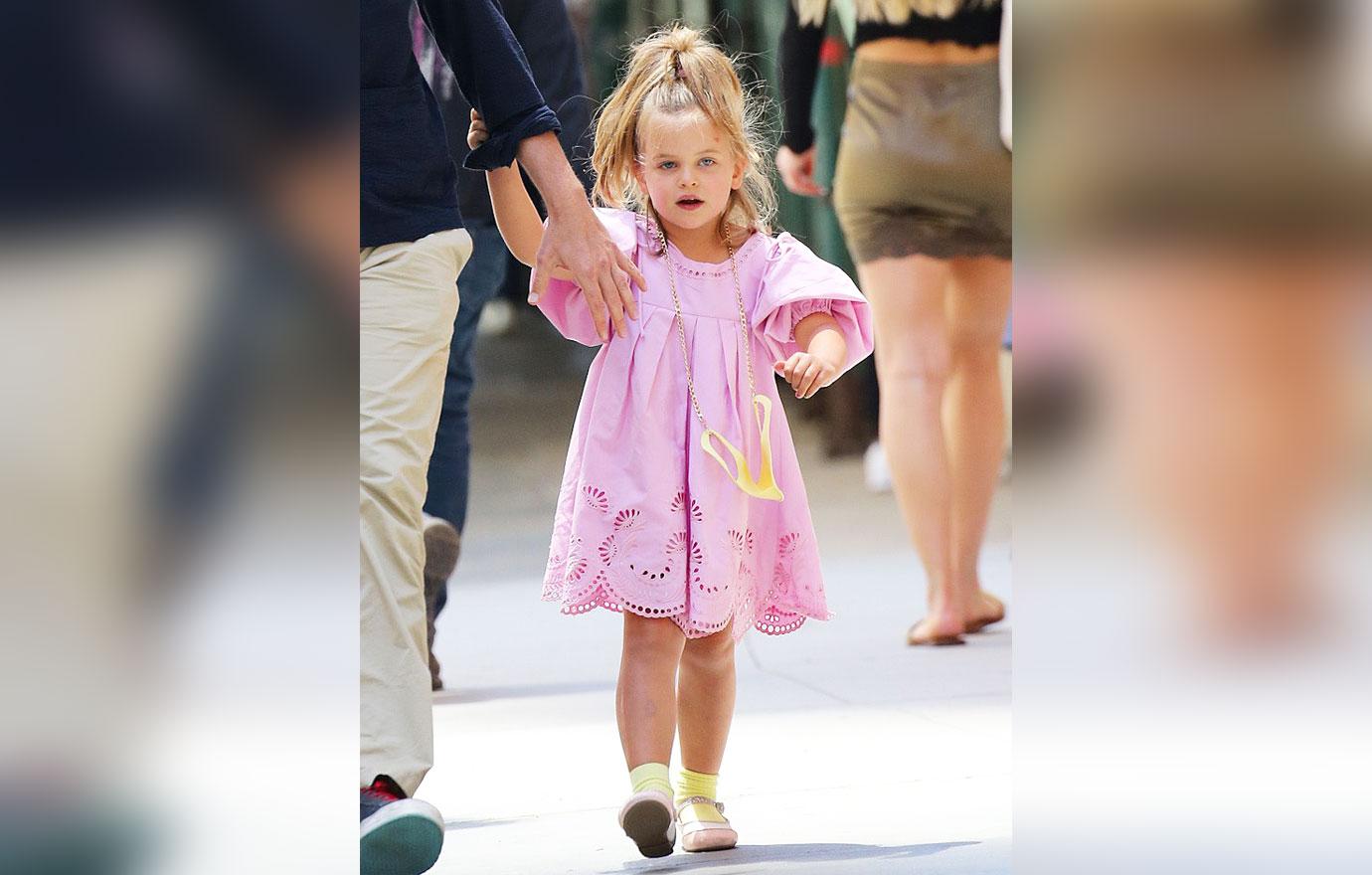 Bradley Cooper, 47, is a doting father as he holds hands with his  five-year-old daughter Lea in NYC