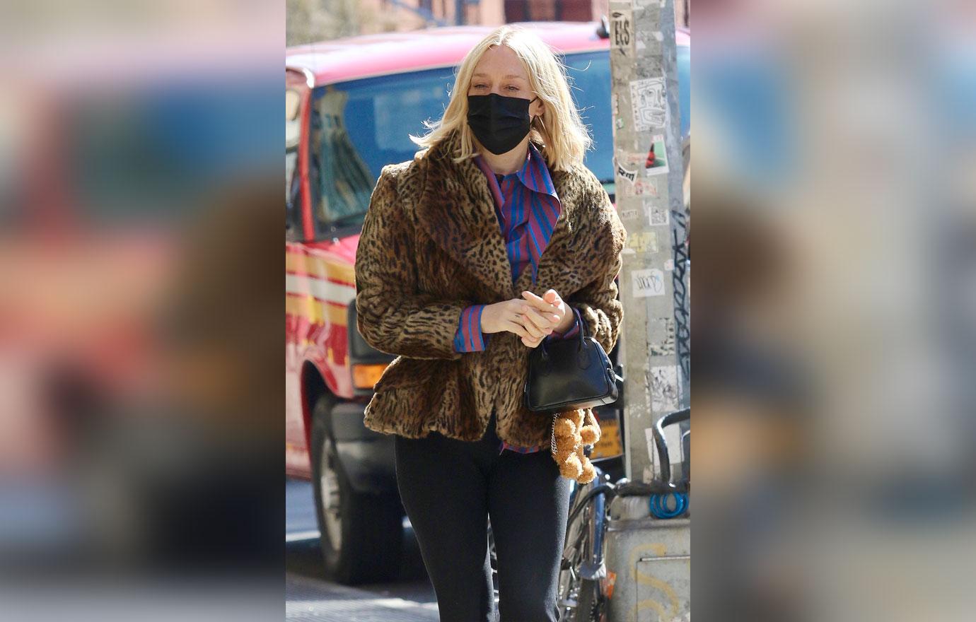 chloe sevigny out in leopard coat and fendi stroller