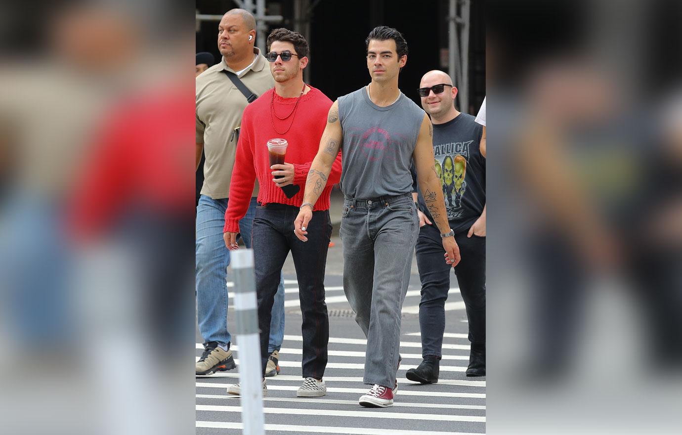 nick and joe jonas walking around tribeca