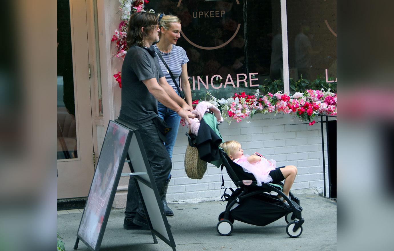 Norman Reedus and fiancée Diane Kruger take a NYC stroll with their  unicorn-obsessed daughter