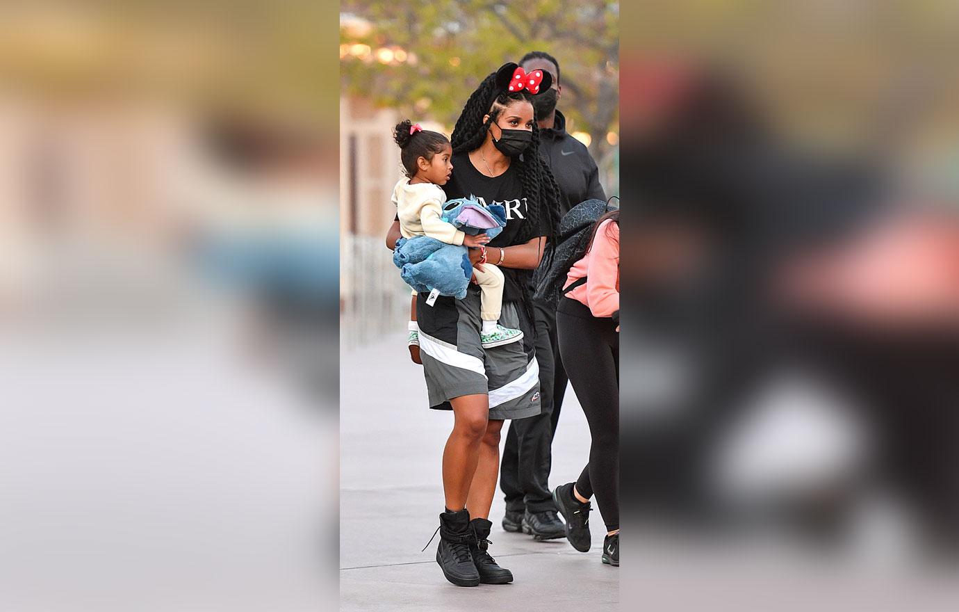 Vanessa Bryant enjoys a day at Disneyland with her daughters Natalia,  Bianka, and Capri