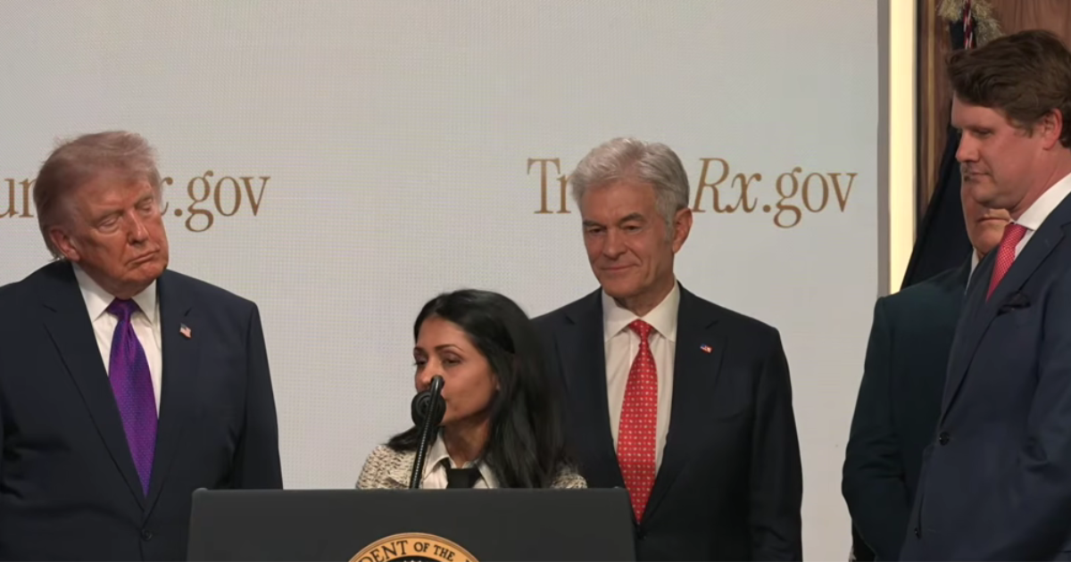 Donald Trump along with other officials and executives