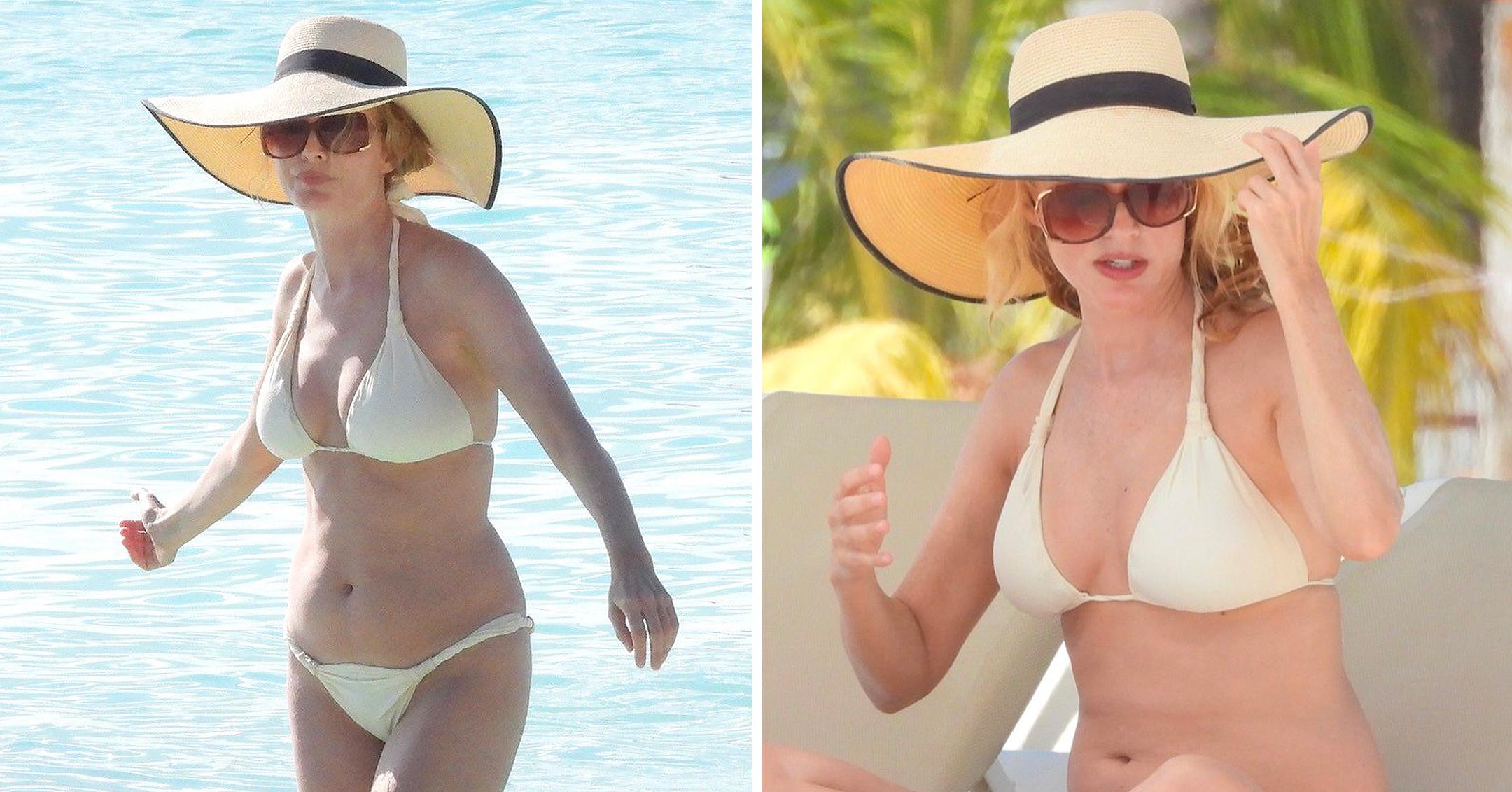 heather graham hits the beach in a white bikini mh