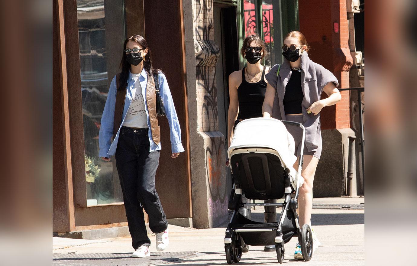 gigi hadid and bella hadid take baby khai for a walk