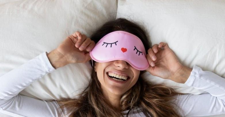 Photo of someone with a sleep mask on. 