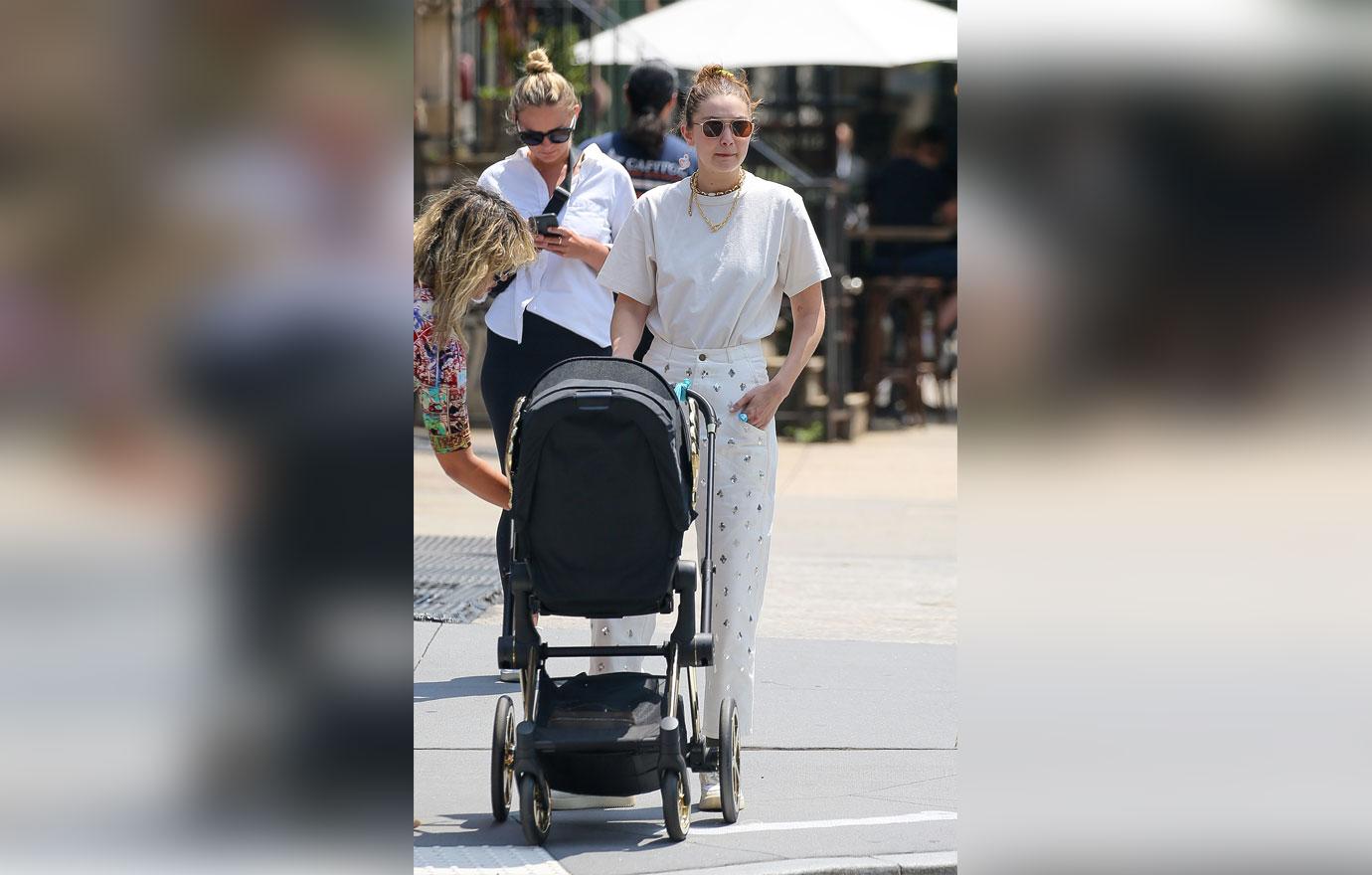 gigi hadid pushing daughter in stroller in nyc