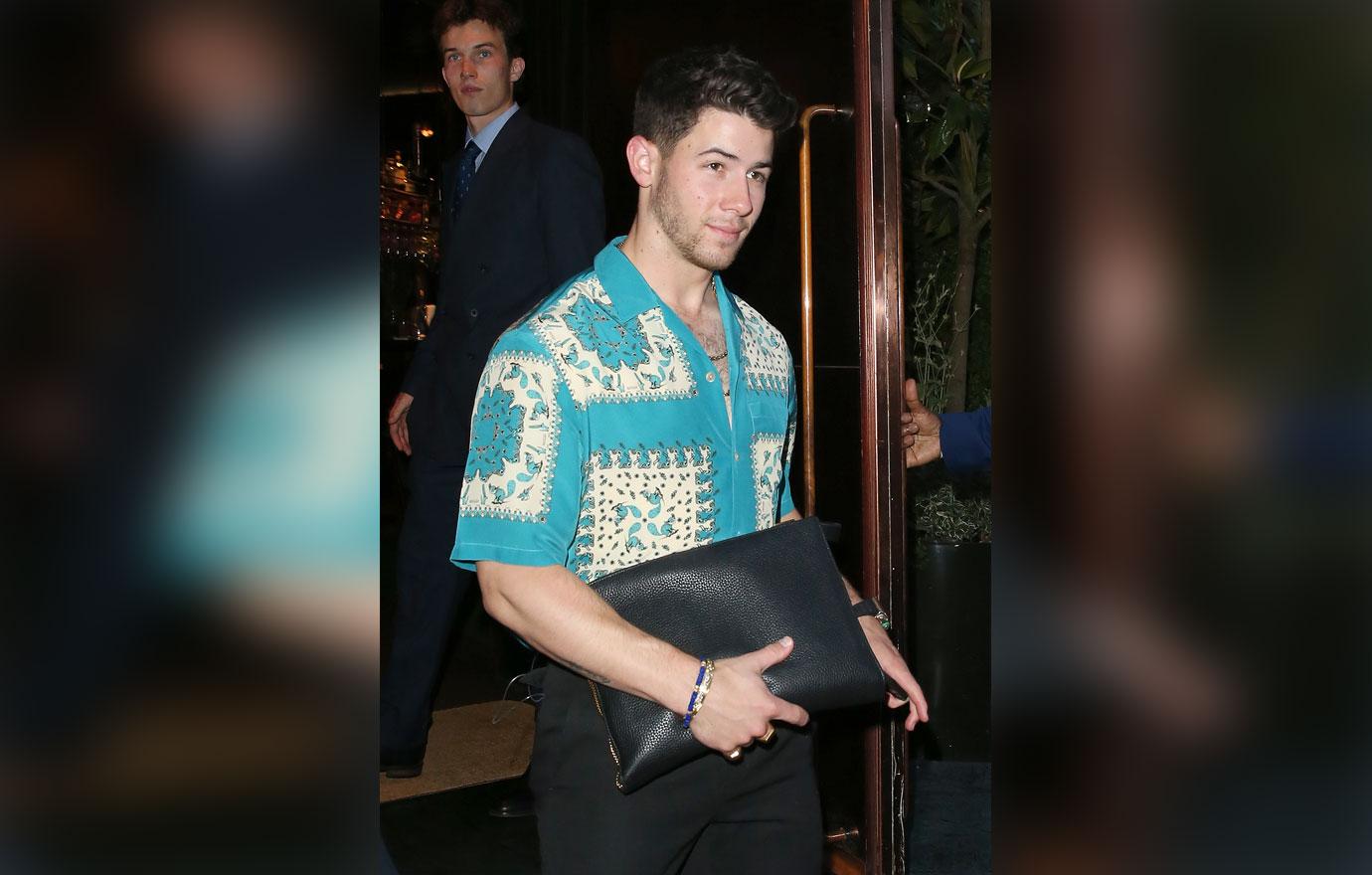 nick jonas leaving restaurant in london