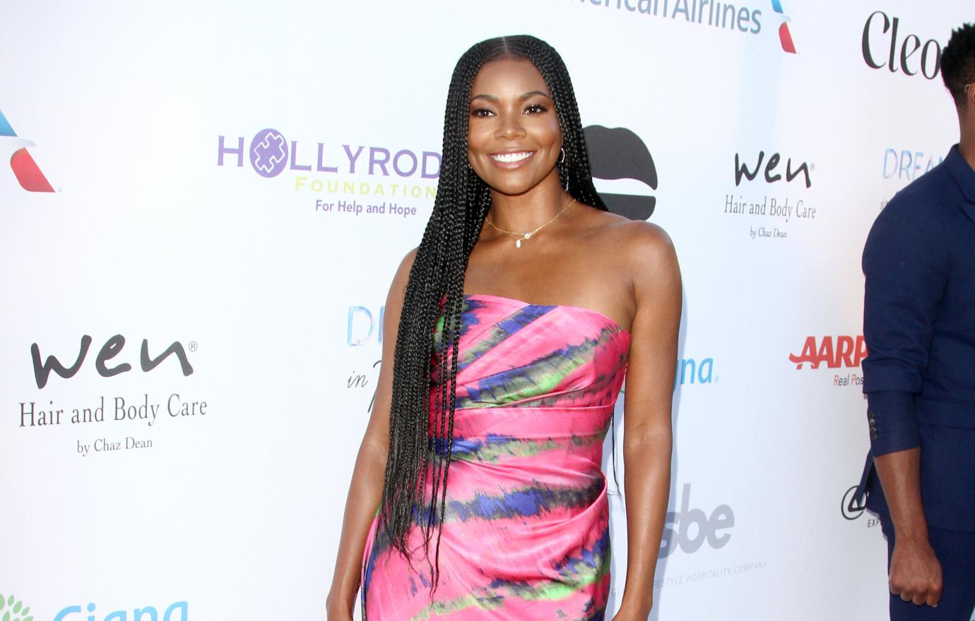 gabrielle union hairs natural texture relaxers assimilate