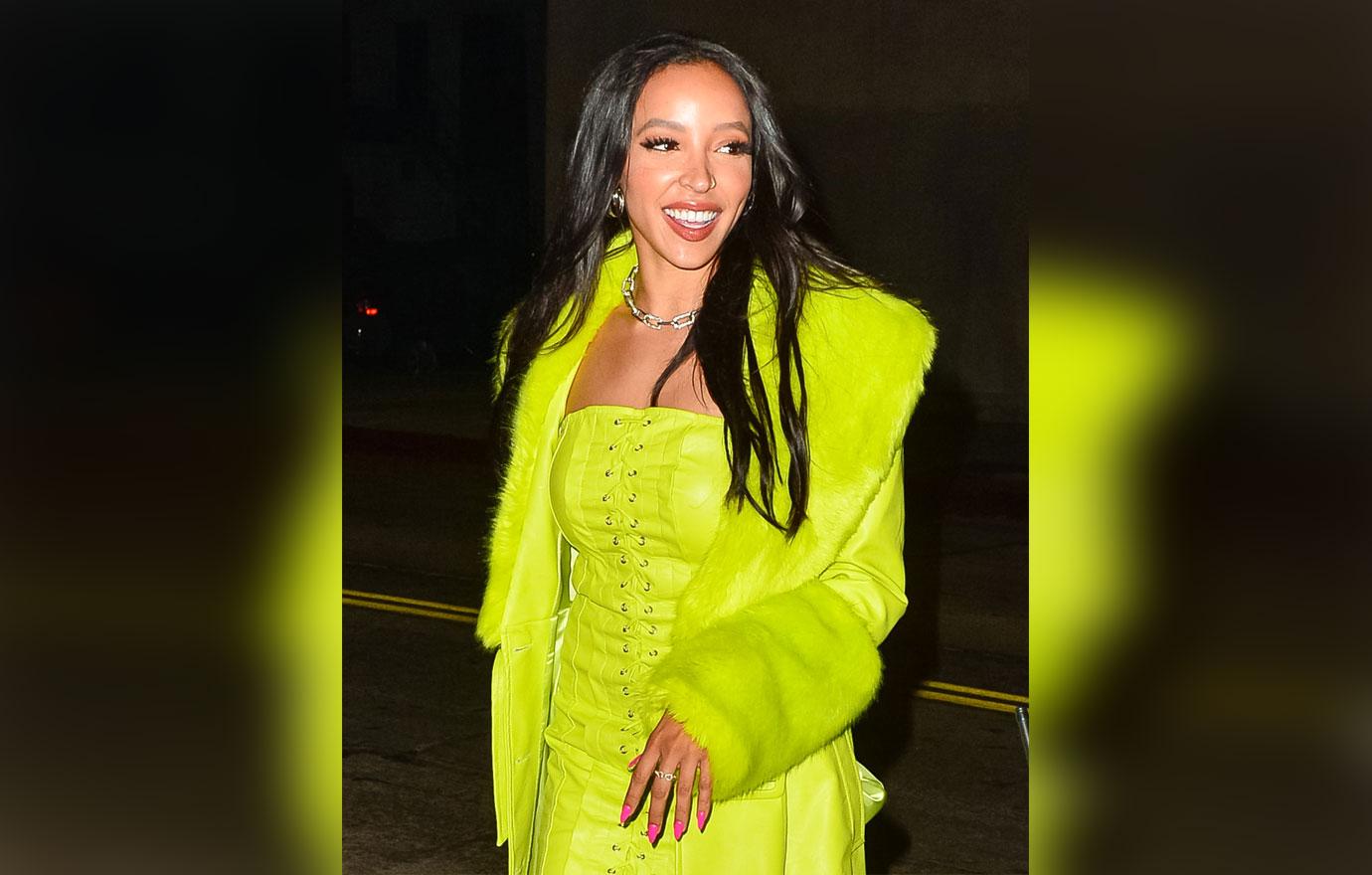 Tinashe Celebrates '333' Album Release In Neon Dress & Matching Coat: Pics