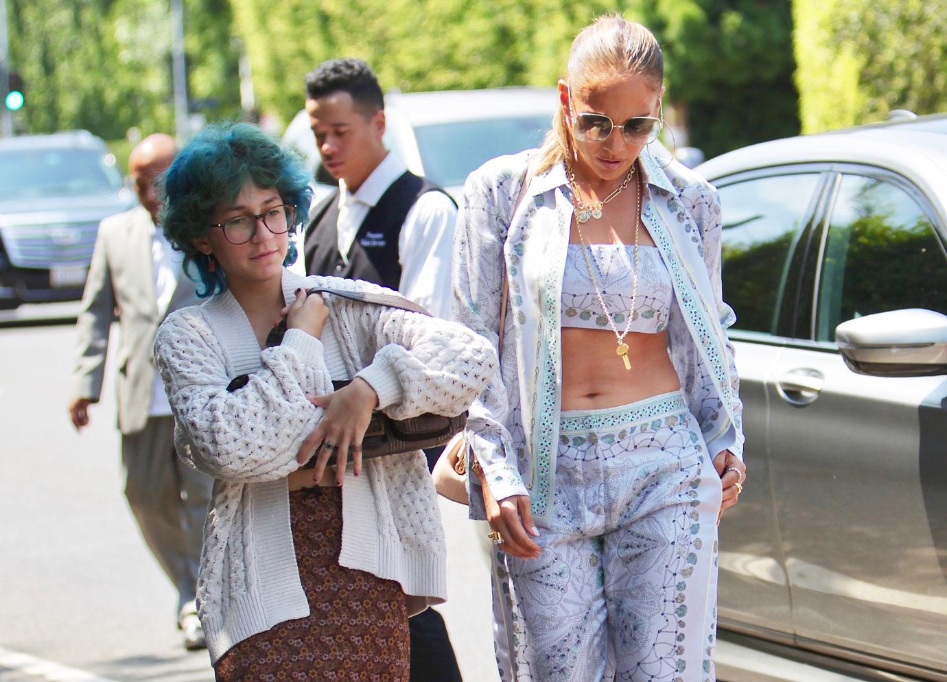 jennifer lopez attends the jennifer klein day of indulgence event with daughter emma showing off her toned abs