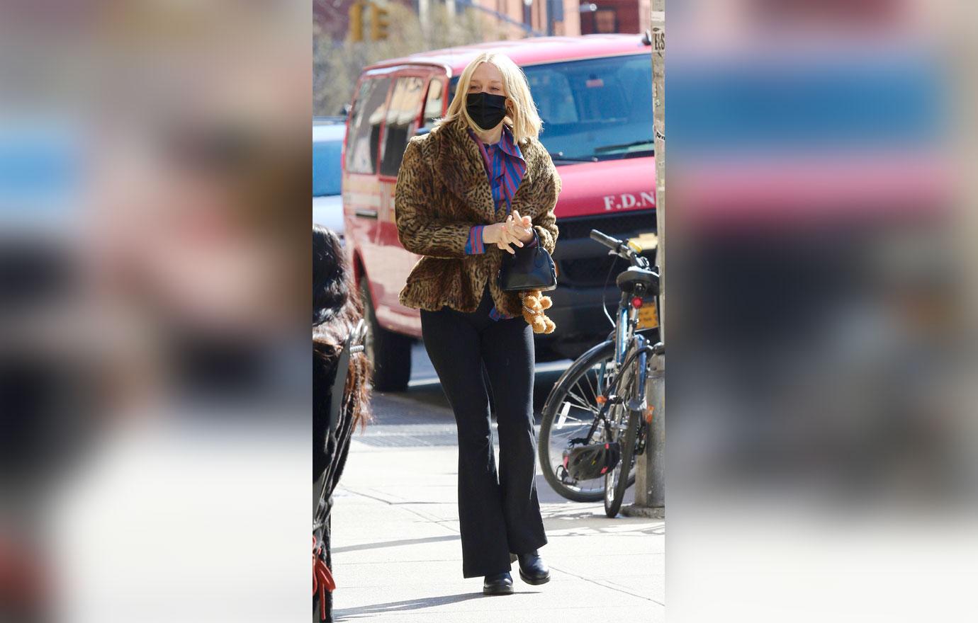 chloe sevigny out in leopard coat and fendi stroller