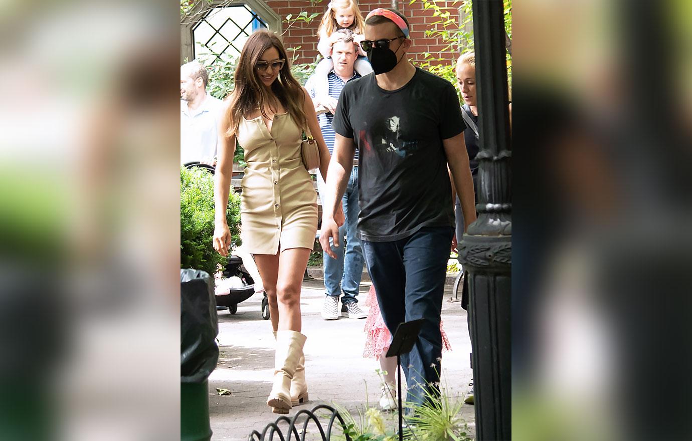 bradley cooper and irina shayk take lea cooper for a walk