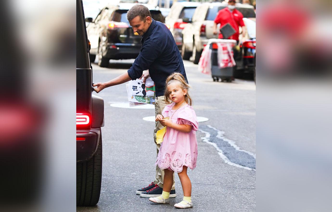 Bradley Cooper sweetly holds hands with daughter Lea, 6, as they enjoy an  after-school ice cream run in NYC