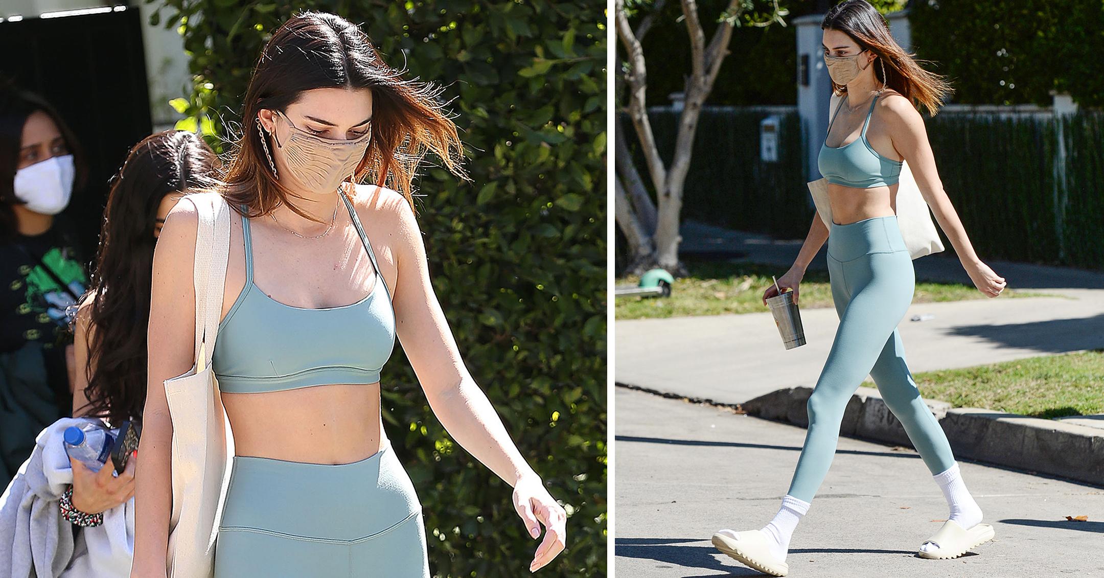 Kendall Jenner shows off tiny waist in crop top and yoga pants